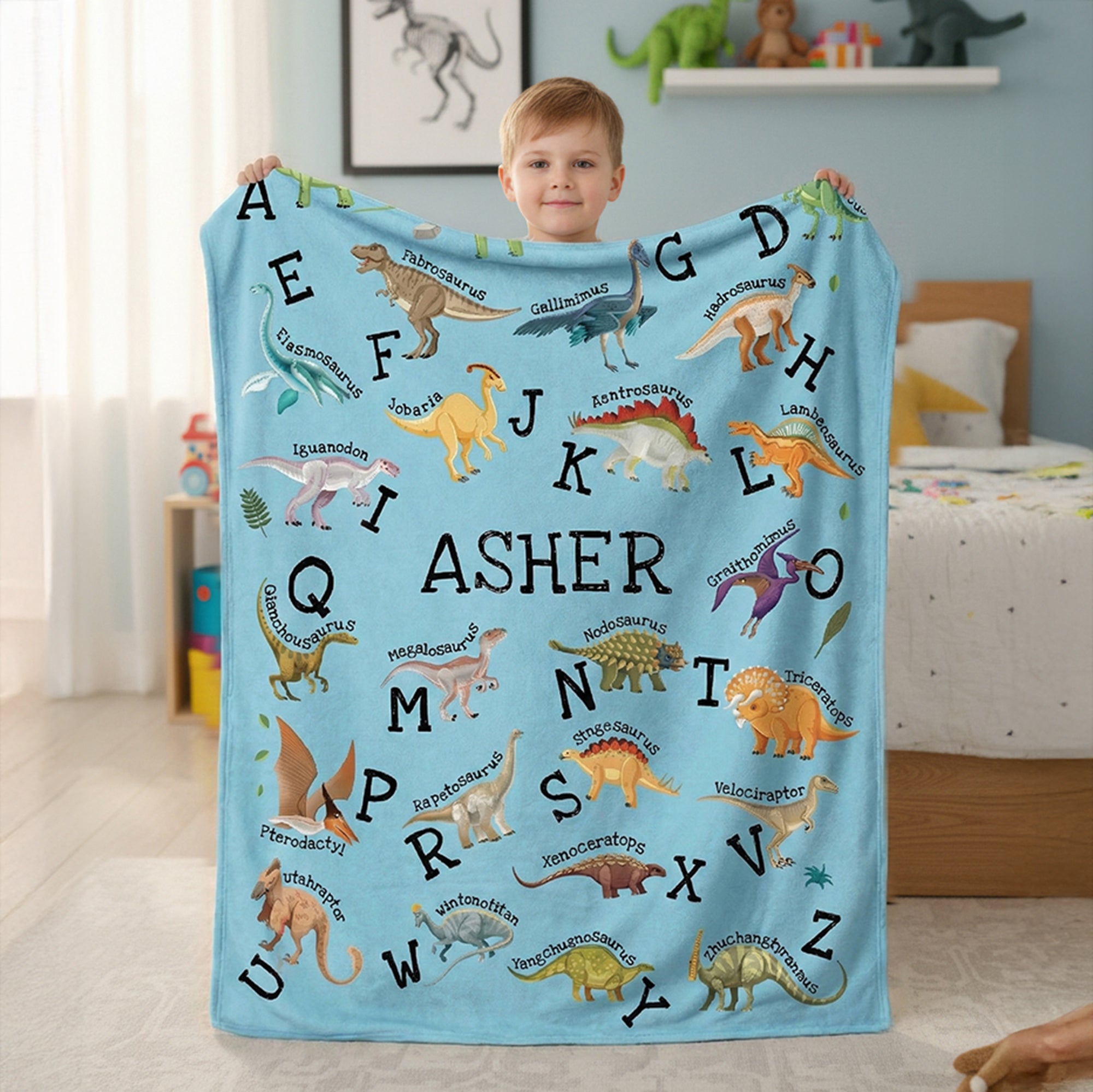 Coperta per bambini con alfabeto di dinosauri The Warmie™